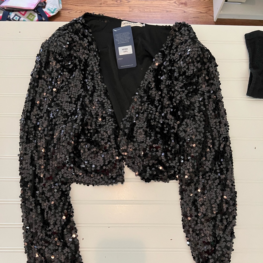New never worn black sequin bolero style jacket